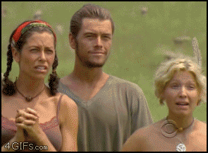 Two shocked women and a guy smiling.