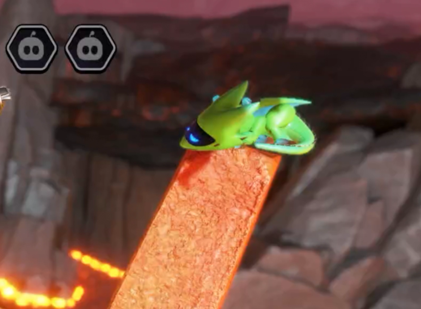 Screenshot from the game "Astro Bot" showing a green robotic dragon lying on a rock spire.