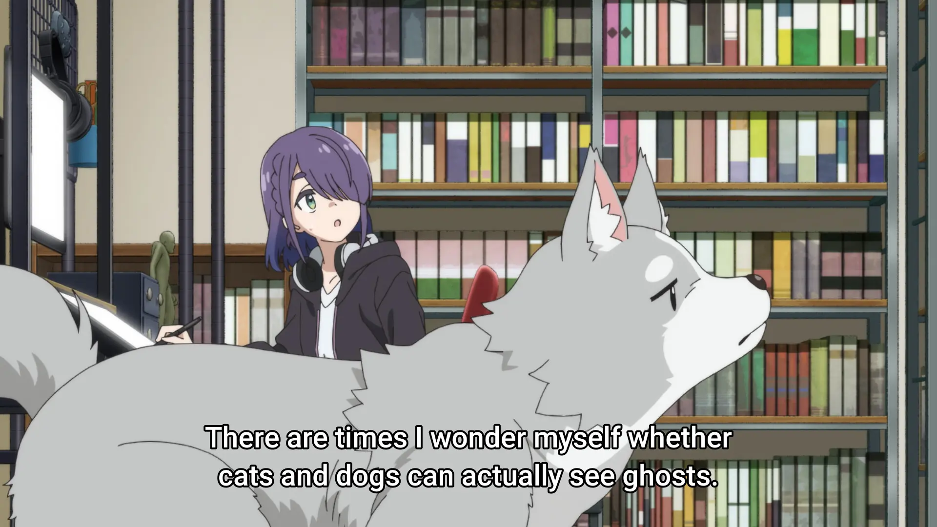 Screenshot from the same anime, now showing one of the artists and her dog in the foreground. It's grey and very fluffy.