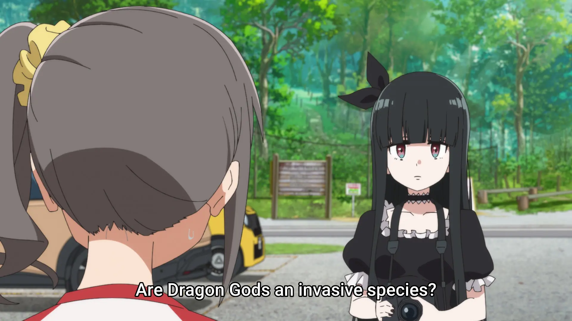 Same anime, showing two girls talking. One asks herself: "Are Dragon Gods an invasive species?"