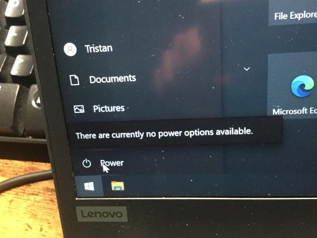 Photo if someone's screen showing the Windows 10 start menu. The power menu is open, but instead of the usual options it says "There are currently no power options available."