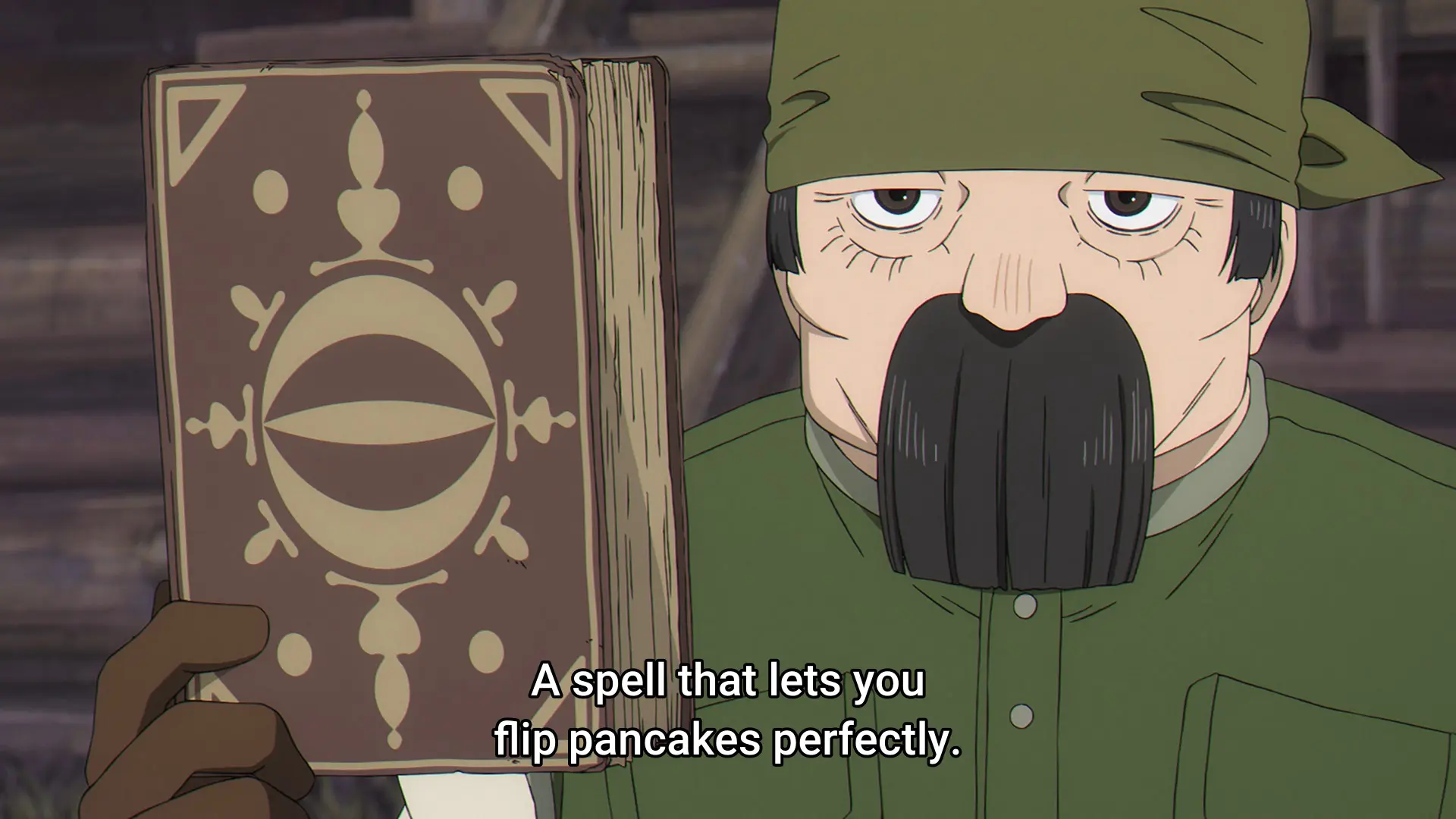 Screenshot from Frieren, featuring a dwarf holding s spell tome. He says "A spell that lets you flip pancakes perfectly."