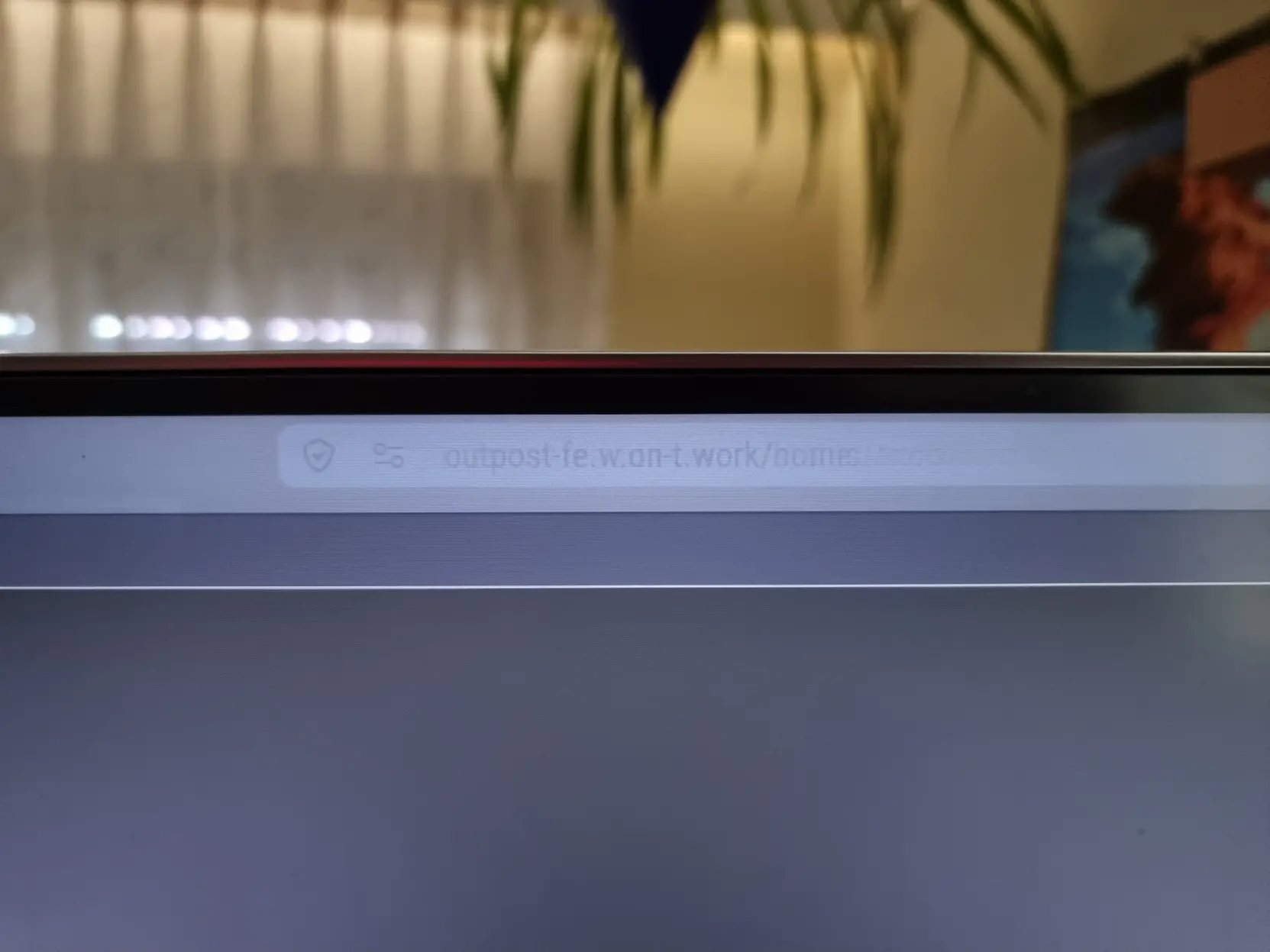 Firefox address bar still visible over a window's dark title bar.